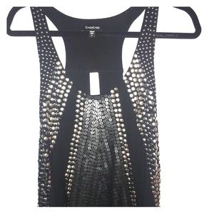 Black top with metallic sequins.